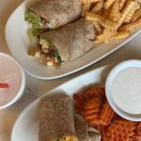 Breakfast Steak Wrap · Sliced steak grilled with onions, peppers and mushrooms, wrapped with scrambled eggs, served...