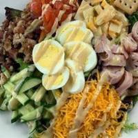 Chef Salad · Smoked turkey, ham, bacon, American and Swiss cheese, cheddar cheese, hard boiled egg, tomat...