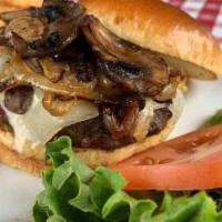 Mos Burger · Mushrooms, onions, and Swiss cheese. Comes with side.