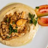 Hummus With Chicken Or Meat · Mashed fresh chickpeas mixed with sesame tahini paste, fresh lemon juice and extra virgin ol...