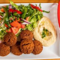 Falafel Platter · Hummus and five pieces falafel mixed with a variety of fresh vegetables.