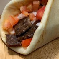 Gyro Sandwich · Combination of beef and lamb gyro meat topped with lettuce, onion, tomatoes, tzatziki sauce,...
