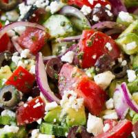 Greek Salad · Tomatoes, pepper, onions, black olives, lettuce, cucumber, feta cheese dressing.