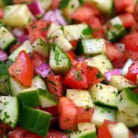House Salad · Lettuce, tomatoes, onion dressing.
