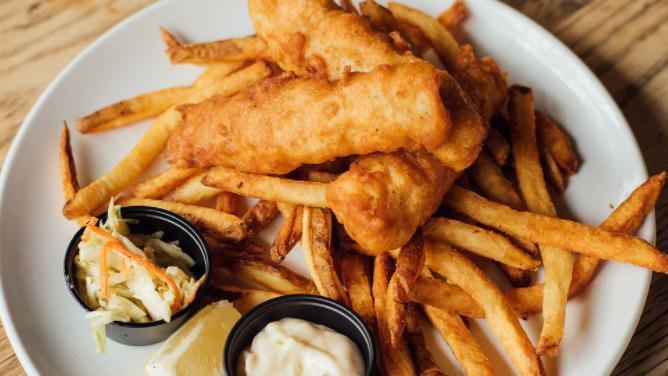Fish And Chips · Beer battered cod, hand-cut fries, jalapeno slaw, tartar sauce.