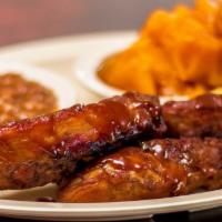 Turkey Ribs · 3 Turkey ribs served with 2 sides and bread