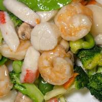 Seafood Delight · Jumbo shrimp tender scallop and imitation crab meat with mushroom, bamboo shoot and mixed Ch...