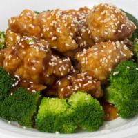 Sesame Chicken · Spicy. Sesame breaded chicken chunks, deep fried, tossed in spicy brown sauce.