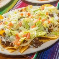 Classico Nachos · Large corn tortillas topped with 