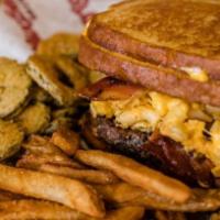 Mac And Cheese Burger · Grilled fresh burger, hickory smoked bacon, and mac and cheese between two grilled cheese sa...