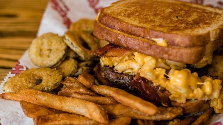 Mac And Cheese Burger · Grilled fresh burger, hickory smoked bacon, and mac and cheese between two grilled cheese sandwiches.