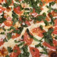 Margherita Pizza · Tomatoes and basil.