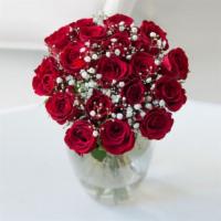Sweet Love Bouquet  · Two Dozen Red Roses and Foliage in beautiful vase.