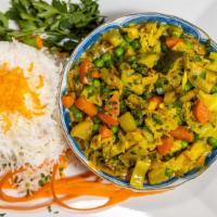 Vegetable Curry · Assorted vegetables with carrots, green peas, cauliflower, green beans, etc.