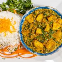 Saag Aloo · Chopped spinach and potatoes cooked with roasted garlic, onion and tomatoes.