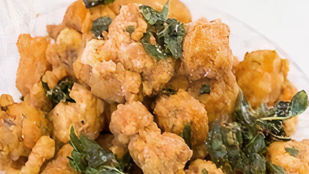 Salt & Pepper Chicken Nuggets · A Taiwanese favorite, our tender chicken nuggets are lightly buttered and seasoned with salt and black pepper served on a bed of basil leaves for a savory treat. Choose from non-spicy, mild, medium or spicy!