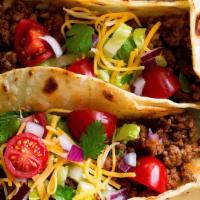 Ground Beef Tacos · 3  Ground beef tacos with lettuce and cheese only