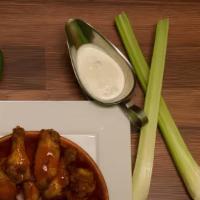 Chicken Wings · With one choice of sauce: hot sauce, BBQ, parmesan garlic, honey mustard, honey garlic, chip...