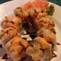 Queen Roll · Tuna, crunch, crab with spicy escolar scallion on top.