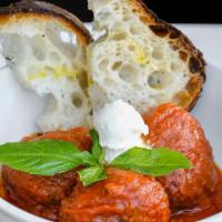 Italian Meatballs · Three homemade meatballs, San Marzano tomato sauce, fresh ricotta cheese, fresh basil, count...