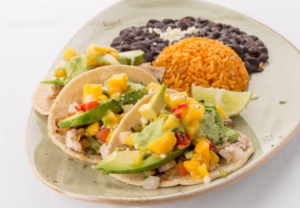 Grilled Chicken Fajita · Flour tortilla filled with grilled chicken, roasted poblano pepper,
refried beans, smoky chipotle wine sauce, with sour cream sauce.