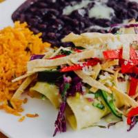 Veracruz · Two pulled chicken, spinach, and Monterey jack enchiladas with tomatillo sauce, marinated ve...
