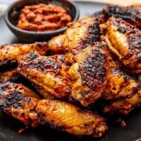 Chicken · Thinly sliced cuts of white meat chicken, marinated with middle eastern spices, wrapped up i...
