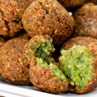 Falafel · Patties of ground cooked garbanzo beans mixed with special blend of spices fried to perfecti...