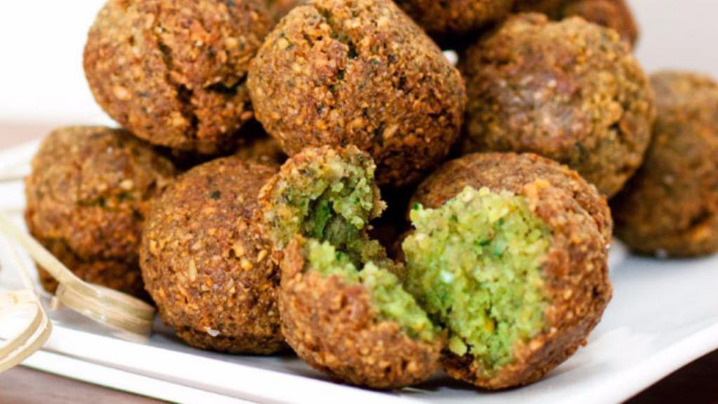 Falafel · Patties of ground cooked garbanzo beans mixed with special blend of spices fried to perfections served with pita bread and tahini sauce.