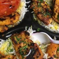 Chicken Kabab · Charbroiled marinated chicken served in a pita bread with lettuce, tomato, onion, pickles an...
