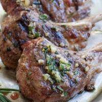 Lamb Chops · Half a rack of lamb chops marinated in our special seasoning.