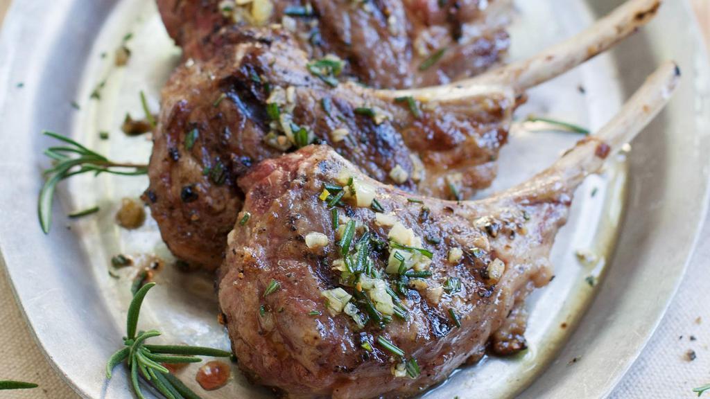 Lamb Chops · Half a rack of lamb chops marinated in our special seasoning.