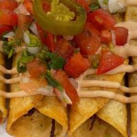 4 Tacos De Pollo/Chicken Flauta Tacos · Tacos De pollo (4) con ensalada de repollo , pico de gallo y crema
 Chicken Flauta Like Taco...