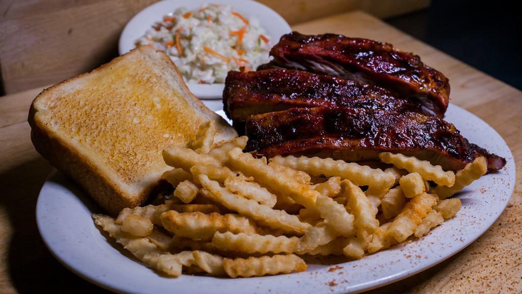 Memphis Style Spare Ribs · Tender, slow smoked ribs hand-rubbed with our award winning seasoning.