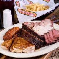 A Taste Of Woody'S · Have it all! A platter of spare ribs, bar-b-q pork, smoked turkey breast, smoked sausage and...