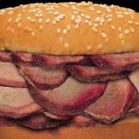 Bar-B-Q Sandwich · We hand slice it and pile it high. You'll love it! Your choice of bar-b-q pork or smoked tur...