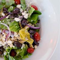 Greek Salad · Fusili pasata, house greens, kalamat olives, tomatoes and red onions tossed in our house gre...