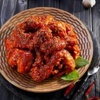 Red Hot Pepper Tikkudak · TIKKU oven chicken tossed in our addictive Gochujang Sauce