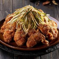 Soy Garlic Spring Onion Chicken · Crispy chicken smothered in a soy glaze and topped with sliced spring onions mixed in our so...