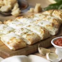 Cheese Bread Stix · A johnny Brusco's favorite. Folded over pizza dough, stuffed with mozzarella, fresh garlic, ...