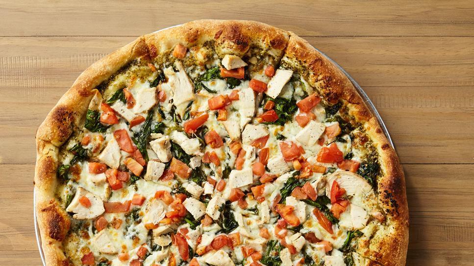 Chicken Florentine · 340-480 cal per slice. Made with pesto sauce and topped with fresh spinach, sliced tomatoes and grilled chicken.
