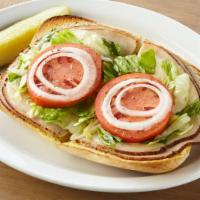 Ham Or Turkey Sub · Your choice of ham or turkey, mayo, mustard, lettuce, tomatoes, onions, provolone cheese and...