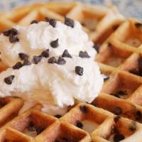 Chocolate Chip Waffle · Chocolate chips, whipped cream, & powdered sugar.