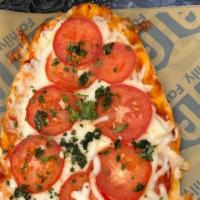 Margherita Pizza · Freshly baked topped with tomato sauce, fresh mozzarella & basil.