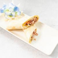 Breakfast Burrito · Egg, diced and grilled onions, peppers and ham.