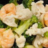 Phoenix And Dragon · Jumbo shrimp, chicken, and assorted vegetables in chef's white sauce. Served with fried rice...