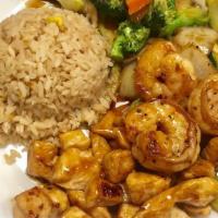 Hibachi Chicken And Shrimp · Served with fried rice or white rice. Green salad, clear soup, and mix vegetable.