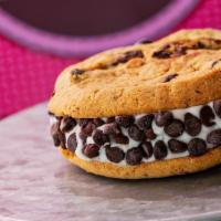 Chocolate Chunk Cookie Sandwich · Our signature buttercream frosting sandwiched between two soft chocolate chunk cookies and r...