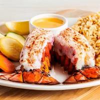Lobster Tails  · Two cold water tails perfectly steamed for maximum tenderness.  Served with butter and lemon.