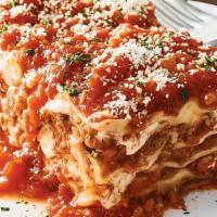 Lasagne · Pasta layered with our pomodoro sauce, meat sauce, ricotta, romano & mozzarella cheese. Serv...